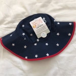 Carter’s red/white/blue hat. Size 0-3 mo. NWT.